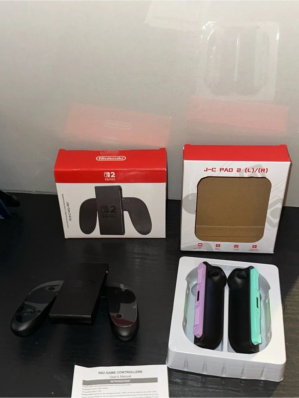 Nintendo Wireless Joy-Con Blue and Orange Accents with Nintendo game grip